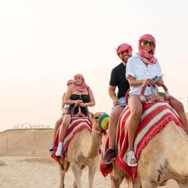 Dubaj: Safari po pustyni z czerwonymi wydmami, quadami, wielbłądami i grillem