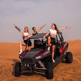 Dubaj: Safari po pustyni z czerwonymi wydmami, quadami, wielbłądami i grillem