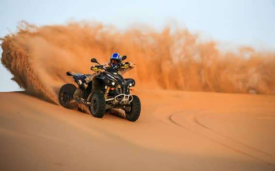 Dubaj: safari po czerwonych wydmach, przejażdżka na wielbłądach, sandboarding i kolacja