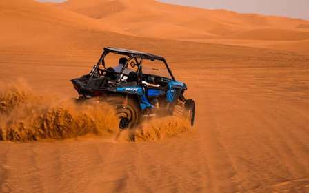 Dubaj: Safari po pustyni z czerwonymi wydmami, quadami, wielbłądami i grillem