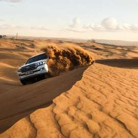 Dubaj: Poranny pustynny quad, buggy lub przejażdżka samochodem 4x4 na czerwonych wydmach