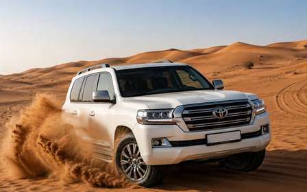 Dubai: VIP Desert Safari with Quad Bike, Camel Ride & Dinner